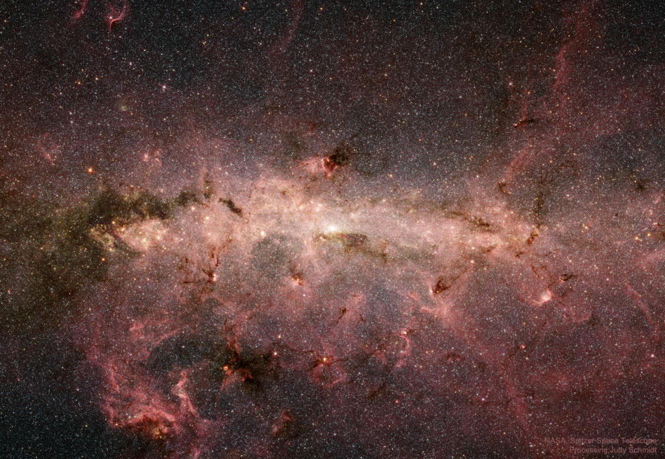 Das Infrarot-Weltraumteleskop Spitzer zeigt das Zentrum der Galaxis, das 26.700 Lichtjahre entfernt im Sternbild Schütze liegt.