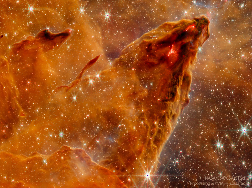 Das Bild zeigt eine Staubsäule im Adlernebel, auch M16, im Sternbild Schlange.