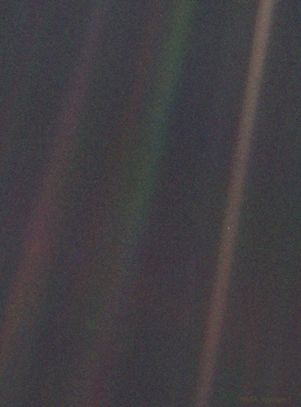 Der berühmte blassblaue Punkt - Pale Blue Dot - ist ein Bild der Erde, das die Raumsonde Voyager I im Jahr 1990 fotografierte.