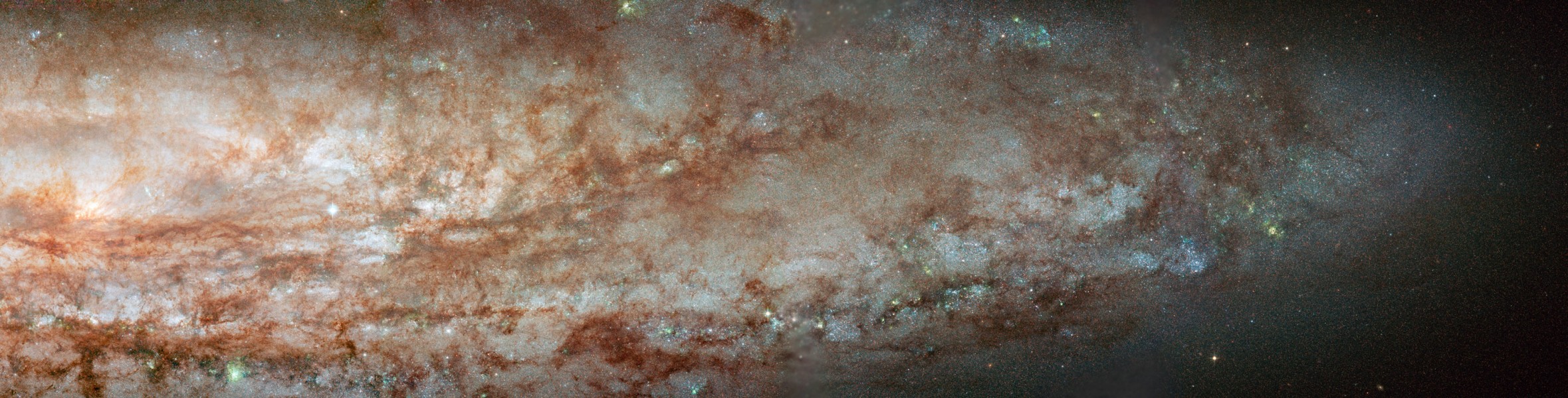 Die Ausläufer einer Galaxie bedecken das halbe, sehr niedrige Bild.