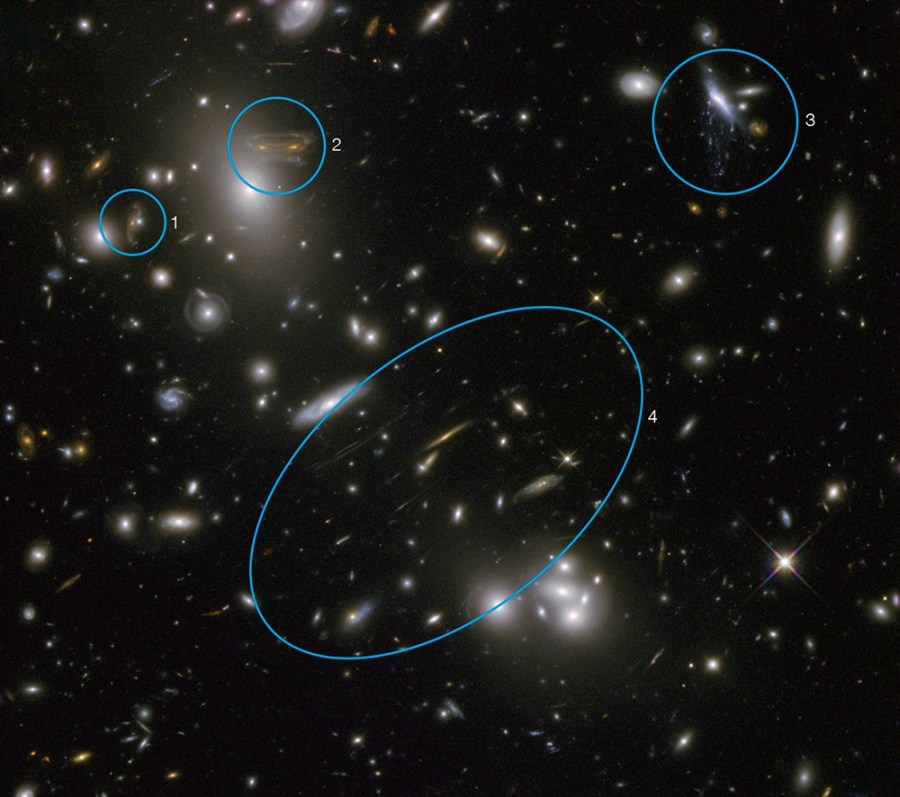Dieses Hubble-Bild zeigt den Galaxienhaufen Abell 68. Es veranschaulicht die Funktion einer natürlichen Gravitationslinse.