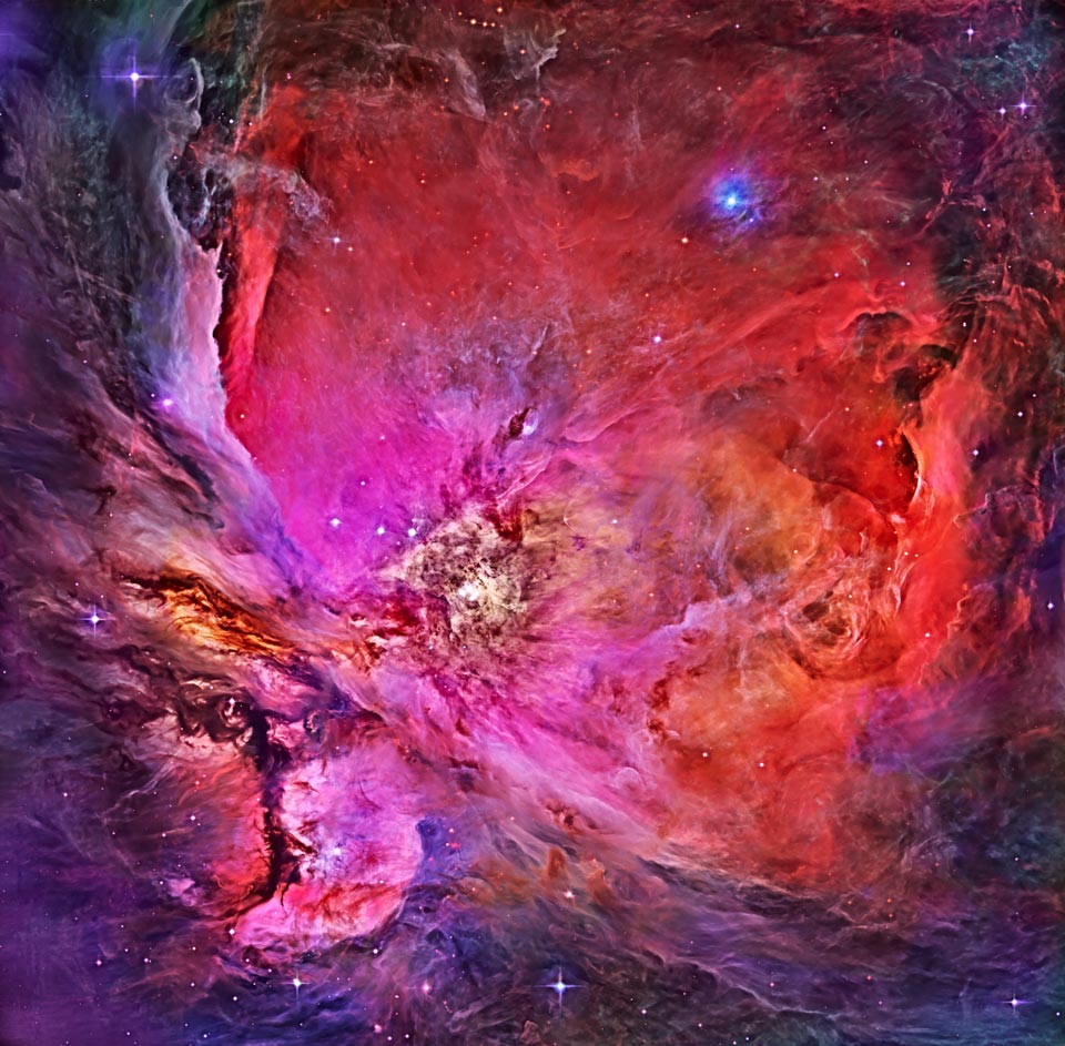 Das Bild des Orionnebels wirkt stark übertrieben und manieristisch. Die Farben sind leuchtendes Lila, Magenta und rot.