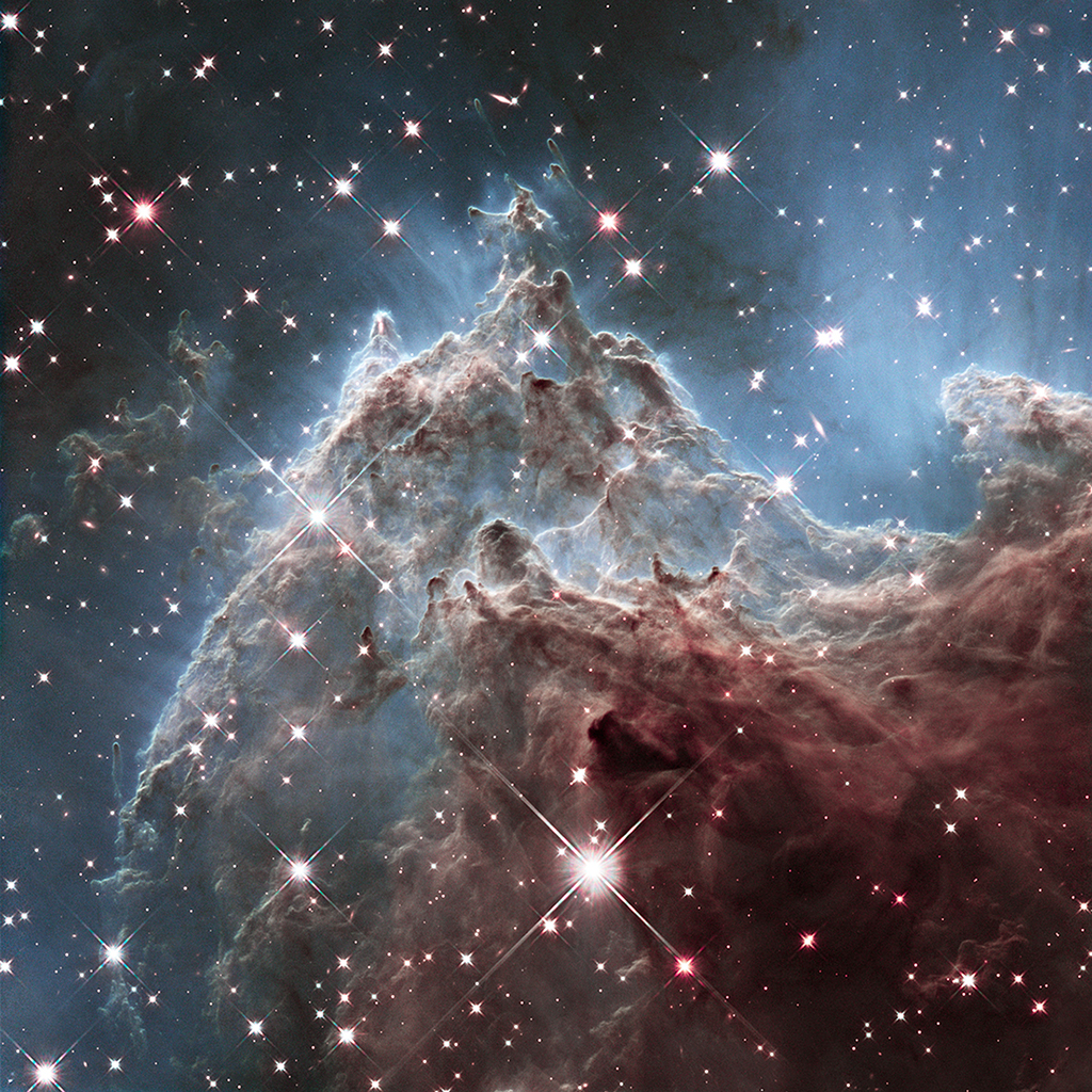 Die Sternbildungsregion NGC 2174 ist etwa 6400 Lichtjahre entfernt und wurde 2014 mit dem Weltraumteleskop Hubble in Infrarotwellenlängen aufgenommen.