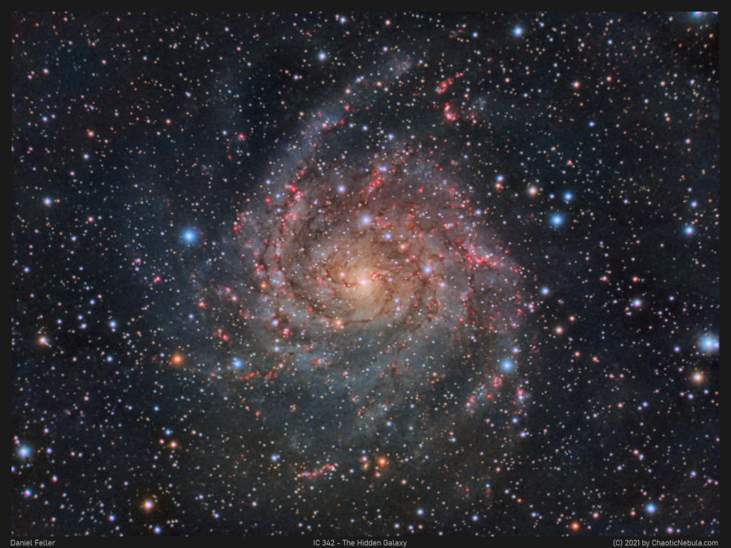 Die große Spiralgalaxie IC 342 im Sternbild Giraffe (Camelopardalis) ist hinter der Ebene unserer Milchstraße versteckt.