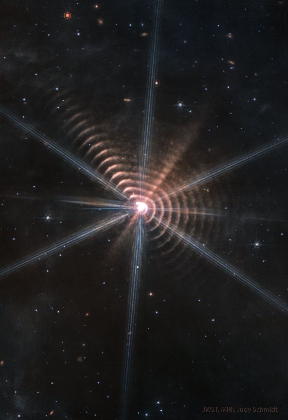 Das neue James-Webb-Infrarotteleskop zeigt die Staubschalen des Wolf-Rayet-Sterns WR 140.