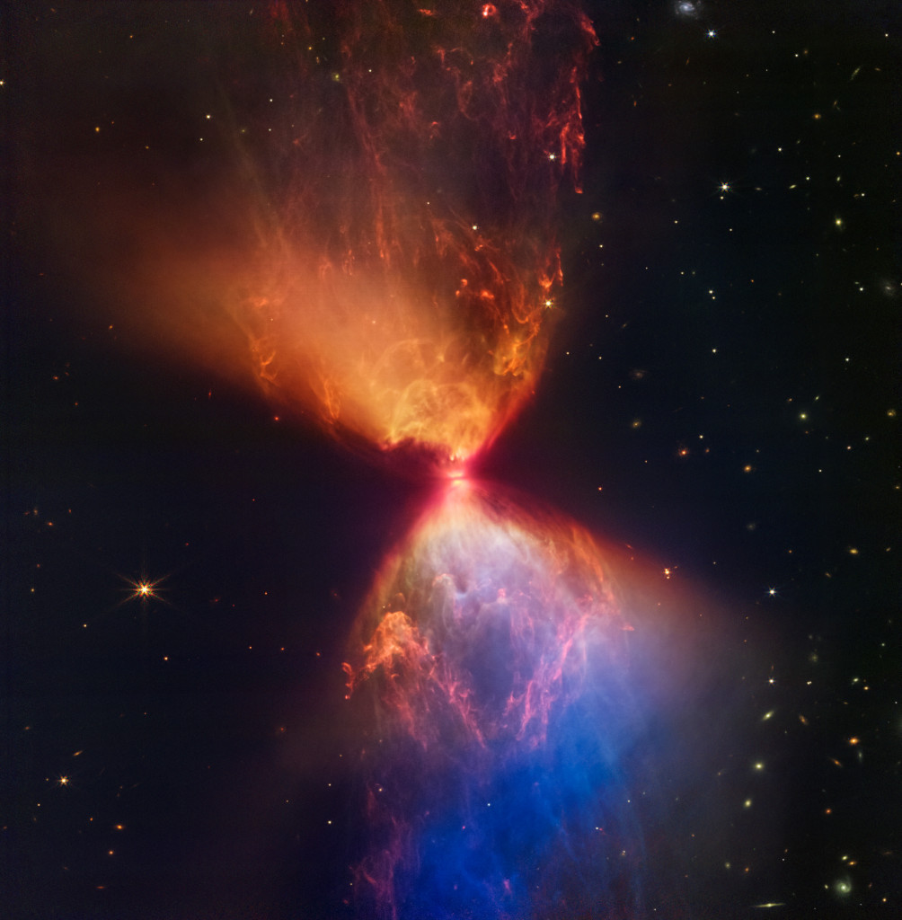Das Bild zeigt Protostern in der dunklen Wolke L1527 mit sanduhrförmigen Flügeln, es stammt vom James-Webb-Weltraumteleskop.