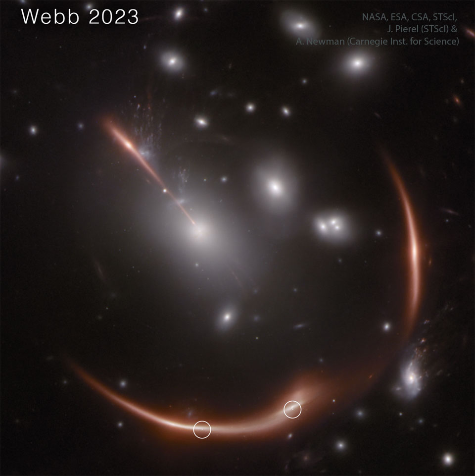 Das Bild zeigt eine Galaxiengruppe mit ungewöhnlichen Bögen. Die Bögen sind Galaxien im Hintergrund, die vom Gravitationslinseneffekt der Gruppe im Vordergrund verzerrt werden. Die Galaxie im Hintergrund hat mehrere Flecken. Es sind Supernovae in der Galaxie.